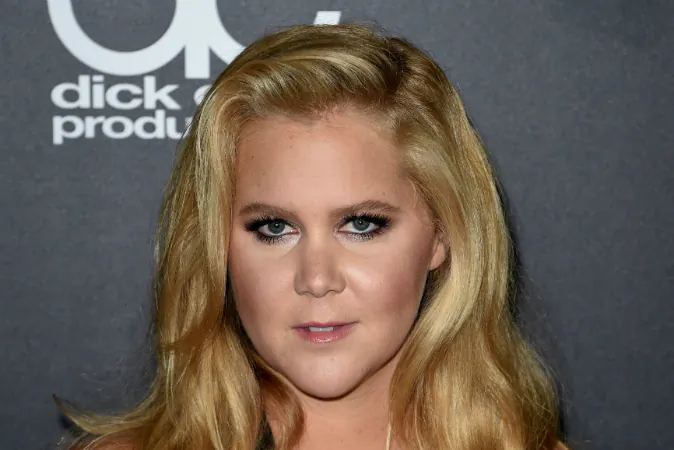 Honoree Amy Schumer arrives for the 19th Annual Hollywood Film Awards at The Beverly Hilton Hotel in Beverly Hills, California on November 1, 2015. (MARK RALSTON/AFP/Getty Images)