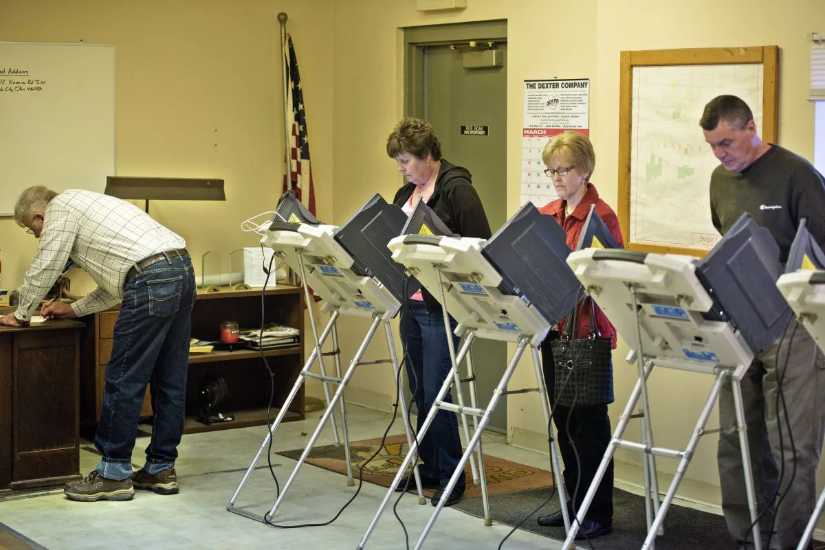 Voters use electronic machines to vote at a polling place during primary voting in Stark County in Beach City, Ohio, on March 15, 2016. (Brendan Smialowski/AFP/Getty Images)