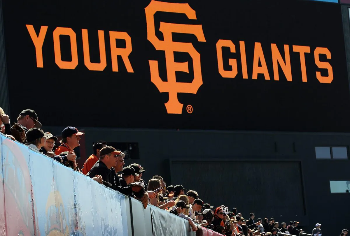Baseball fans watch batting practice before the start of the San Francisco Giants home opener against the St. Louis Cardinals at AT&T Park on April 8, 2011 in San Francisco, California. (Justin Sullivan/Getty Images) 