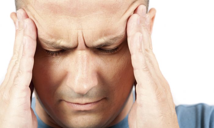 A stock photo of a migraine sufferer (Catalin Petolea/iStock)