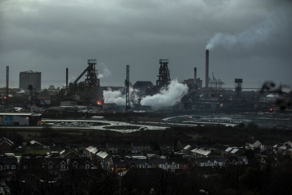 Steam rises from the blast furnaces at the Tata Steel processing plant in Port Talbot, Wales, on Jan. 15, 2015. (Matt Cardy/Getty Images)