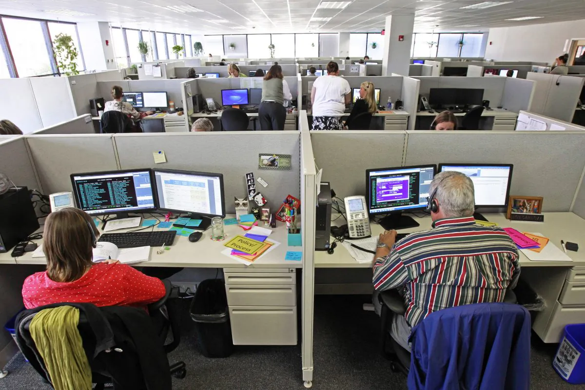 Workers at the Vermont Health Connect call center talk to customers in Burlington, Vt., on Oct. 1, 2013. (Toby Talbot/AP Photo)
