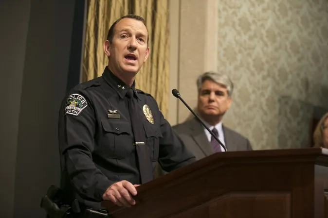 APD Assistant Chief Troy Gay, left, speaks as University of Texas President Gregory L. Fenves, right, listens during a news conference about the death of student Haruka Weiser on Thursday, April 7, 2016 in Austin, Texas. The first-year dance student was the victim of a homicide and police are searching for a man seen near the heart of campus, where her body was found. (Deborah Cannon/Austin American-Statesman via AP)