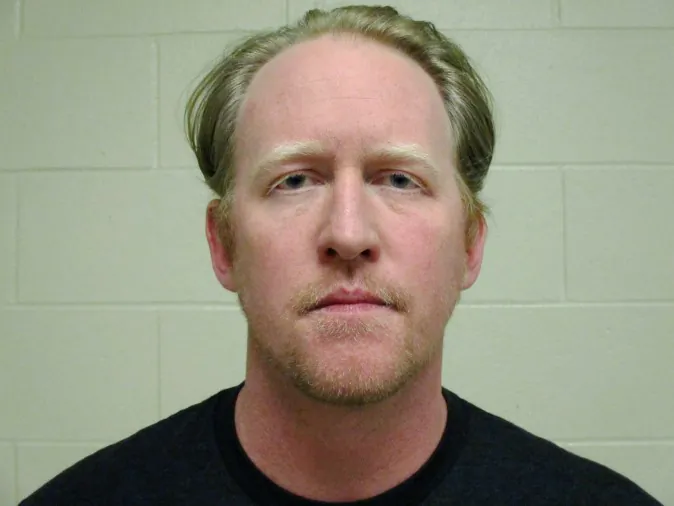 Former U.S. Navy SEAL Robert O'Neill is seen in this handout photo provided on Friday, April 8, 2016, by the Butte-Silver Bow County Undersheriff.  Montana authorities have filed drunken driving charges against the former U.S. Navy SEAL who says he fired the shots that killed Osama bin Laden. Butte-Silver Bow County Undersheriff George Skuletich says officers found O'Neill asleep early Friday in a running car parked at a convenience store in his hometown. (Butte-Silver Bow County Sheriff's Office via AP)