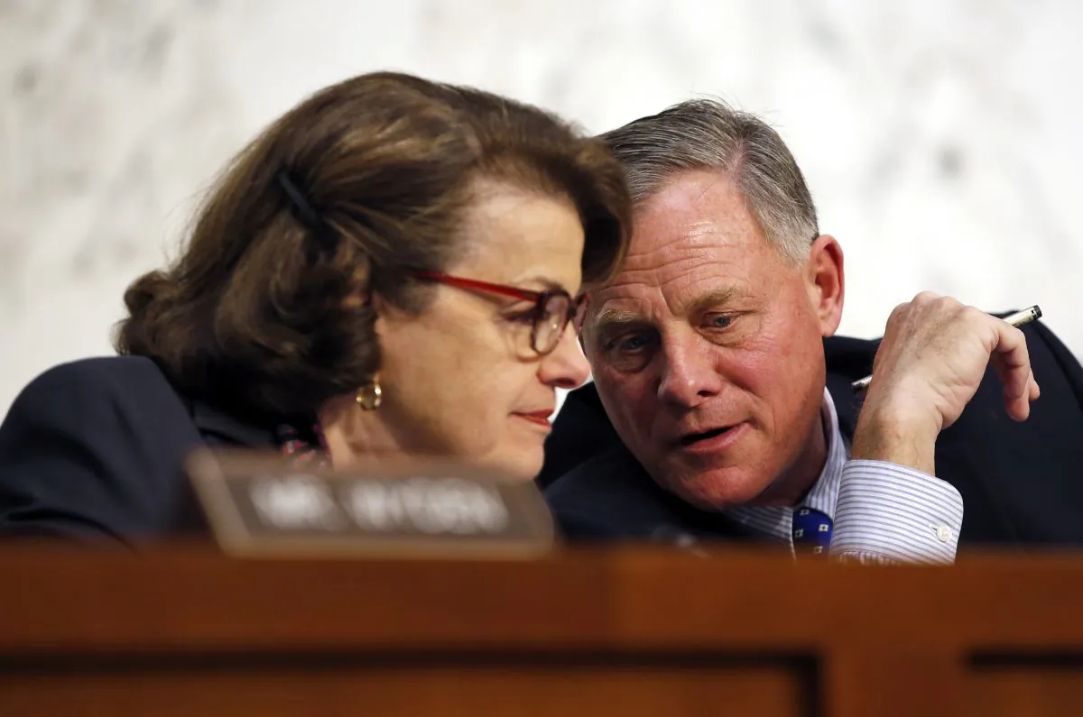 In this Feb. 9, 2016 file photo, Senate Intelligence Committee Vice Chair Sen. Dianne Feinstein, D-Calif., talks with committee chairman Sen. Richard Burr, R-N.C. on Capitol Hill in Washington. A draft version of a Senate bill would effectively prohibit unbreakable encryption and require companies to help the government get access to readable data on a device if theres a lawful search warrant. The draft is being finalized by Burr and Feinstein. (AP Photo/Alex Brandon, File)