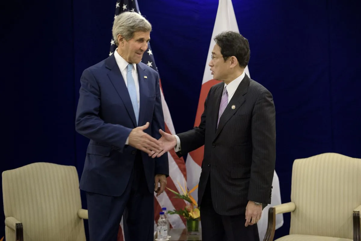 US Secretary of State John Kerry (L) and Japans Foreign Minister Fumio Kishida shake hands before a bilateral meeting in Kuala Lumpur on August 6, 2015.    AFP PHOTO / POOL / BRENDAN SMIALOWSKI        (Photo credit should read BRENDAN SMIALOWSKI/AFP/Getty Images)