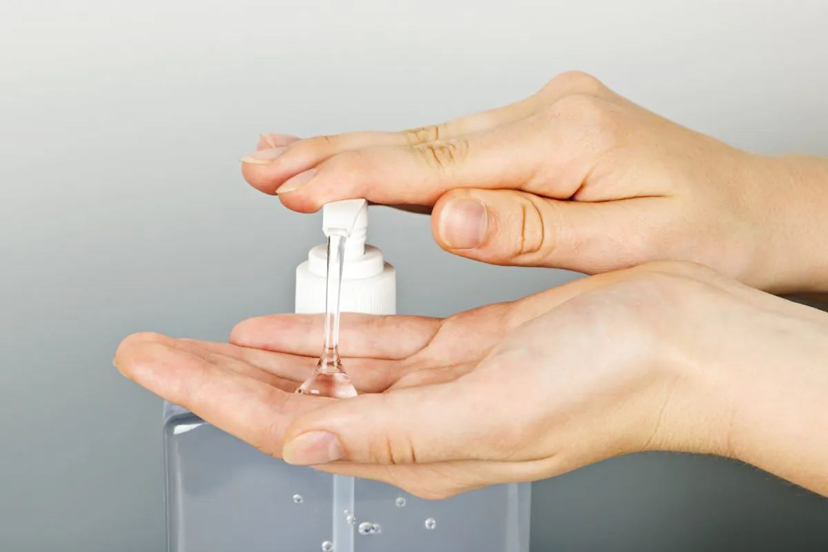 A person applies hand sanitizer gel to their hands in a file photo. (Elenathewise/iStock)