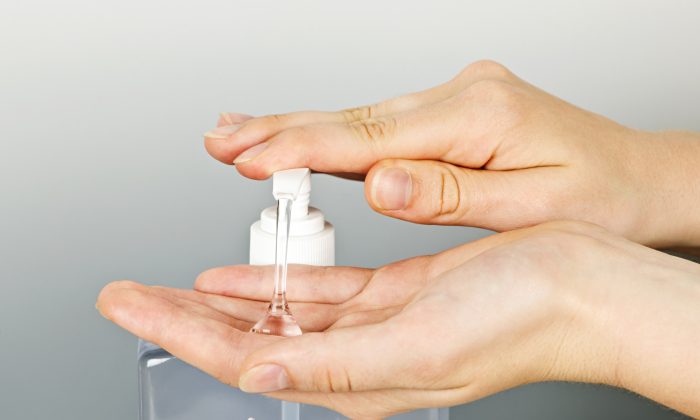 A person applies hand sanitizer gel to their hands in a file photo. (Elenathewise/iStock)