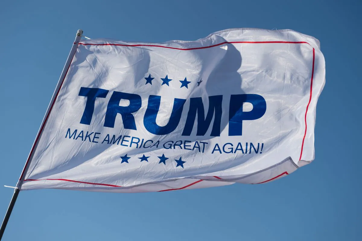 A Donald Trump campaign flag waves outside a Trump rally at Millington Regional Jetport on February 27, 2016 in Millington, Tennessee. (MICHAEL B. THOMAS/AFP/Getty Images)