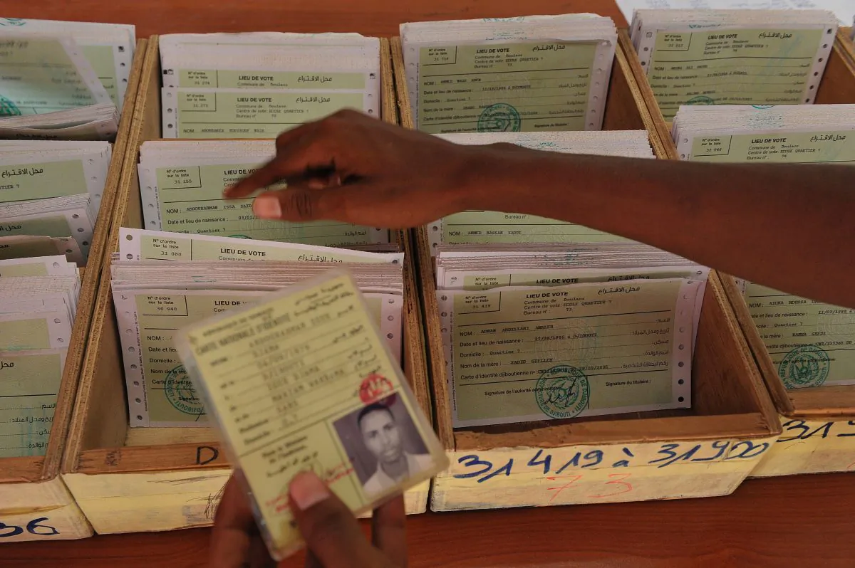 A Djiboutian electoral agent searching for a voters card at a polling station in Djibouti on March 22, 2016. Elections in Djibouti are scheduled to be held in April 2016. Current President Ismail Omar Guelleh, who has been in office since May 8, 1999, is up for re-election. (Simon Maina/AFP/Getty Images)