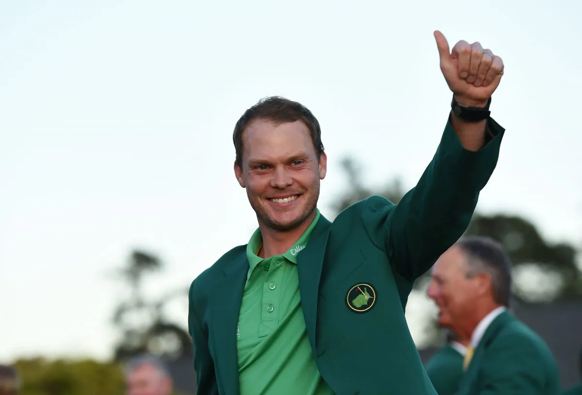 England's Danny Willett waves wearing his Green Jacket at the end of the 80th Masters Golf Tournament at the Augusta National Golf Club on April 10 in Augusta, Georgia. (Don Emmert/AFP/Getty Images)