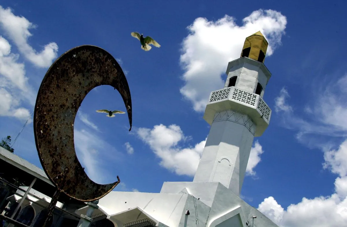 The Kaumpurnah mosque in Basilan island on June 2001. Islam in southern Philippines was introduced by Arab missionaries before the 16th century, while Christianity was brought later by the Spanish. While the two religions co-existed, Christianity made inroads in the Islamic south pushing Muslims inland. The land conflict erupted into a full blown separatist rebellion in the late 1970s. The seccesionist movement continued even after a peace agreement was signed in 1997 between the dominant rebel group, Moro National Liberation Front, and the government. (Romeo Gacad/AFP/Getty Images)