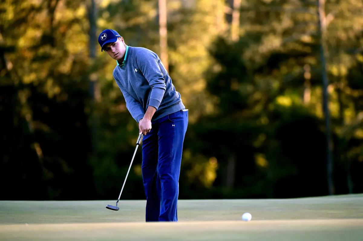 Jordan Spieth of the United States putts on the 18th green during the third round of the 2016 Masters Tournament at Augusta National Golf Club in Augusta, Ga., on April 9, 2016. (Harry How/Getty Images)