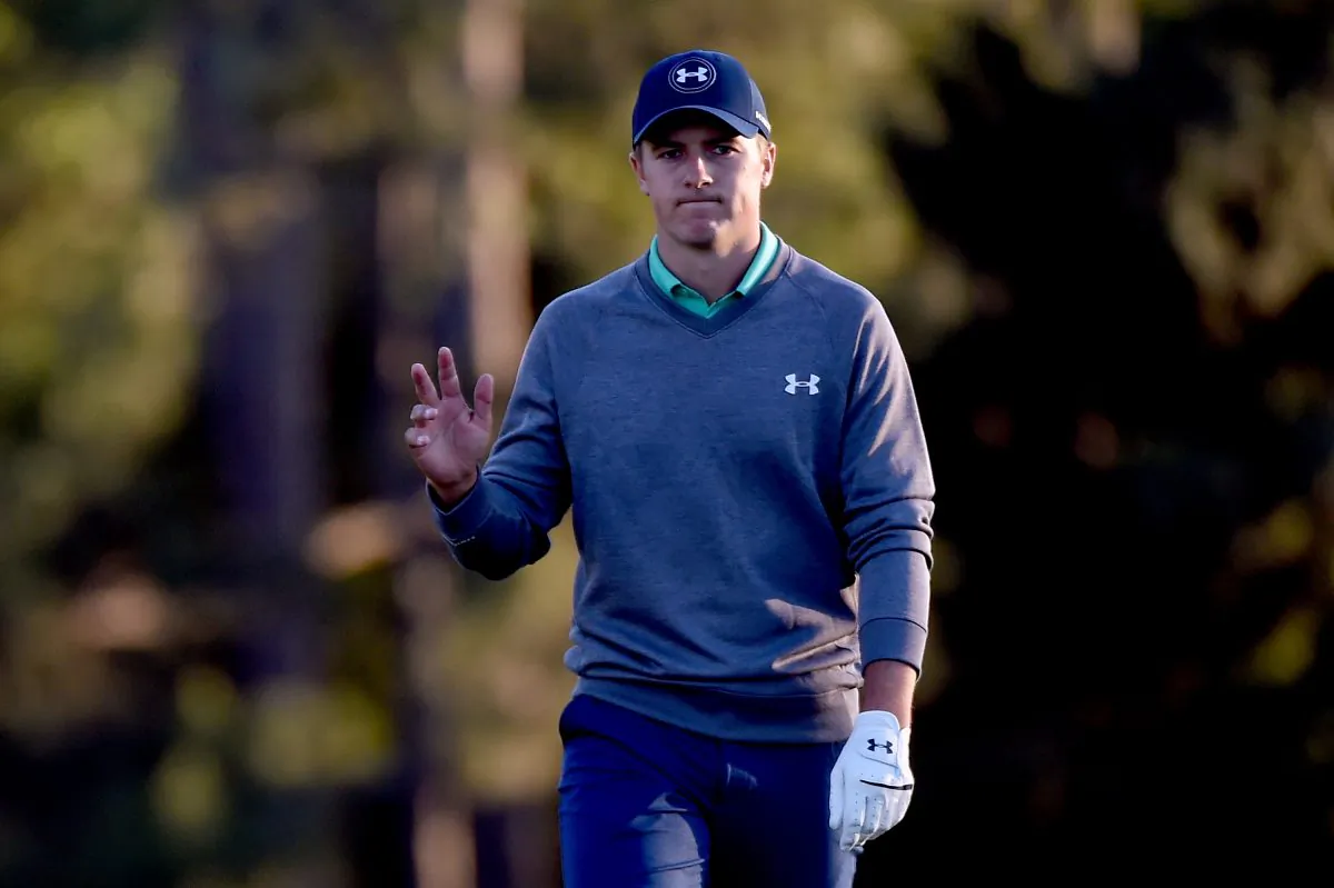 Jordan Spieth reacts on the 18th green during the third round of the 2016 Masters Tournament at Augusta National Golf Club on April 9. (Harry How/Getty Images) 