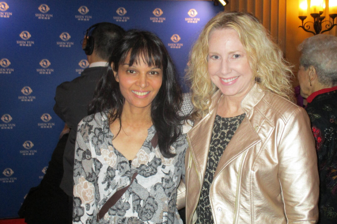 Seema Rahmani and her friend enjoy an afternoon showing of Shen Yun Performing Arts at Bridges Auditorium in Pomona College on April 8, 2016. (Albert Roman /Epoch Times)