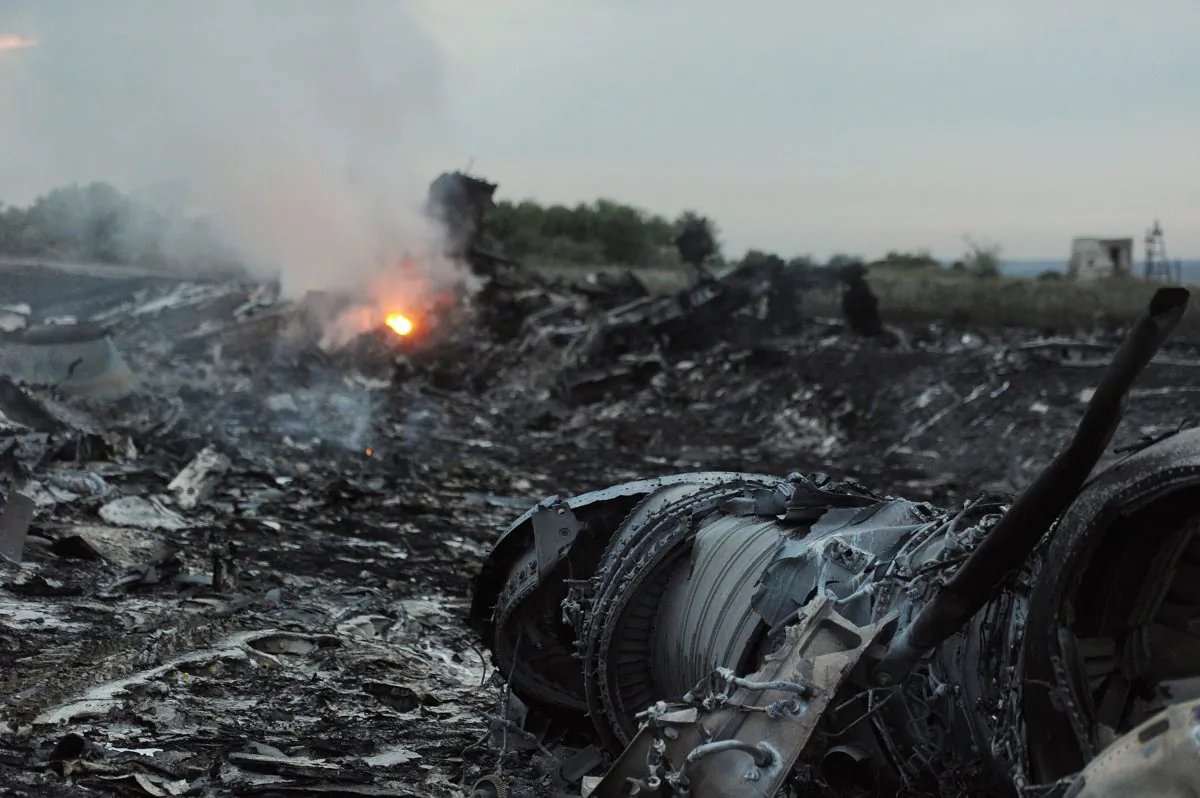 The wreckage of a malaysian airliner carrying 295 people from Amsterdam to Kuala Lumpur in Ukraine, on July 17, 2014. (DOMINIQUE FAGET/AFP/Getty Images)