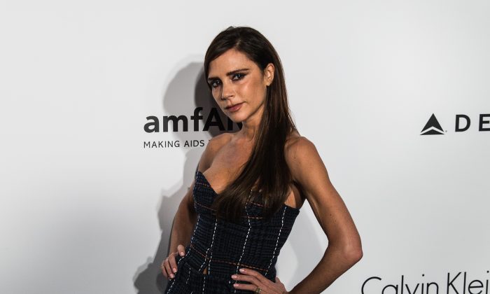 British designer and singer Victoria Beckham arrives for the 2016 American Foundation for AIDS Research (amfAR) Hong Kong gala at Shaw Studios in Hong Kong on March 19, 2016. (ANTHONY WALLACE/AFP/Getty Images)