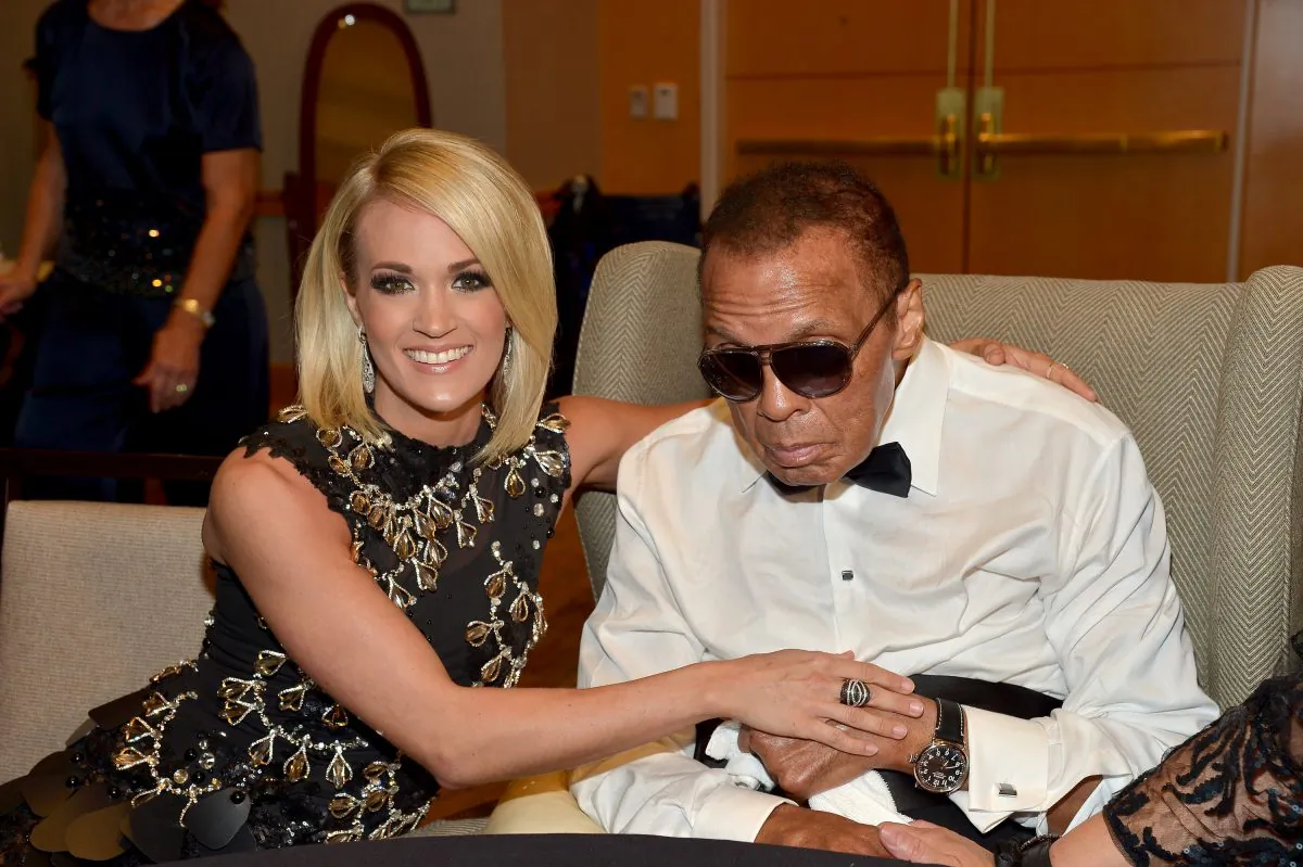 Muhammad Ali Celebrity Fight Night Award honoree Carrie Underwood (L) and Muhammad Ali attend Muhammad Ali's Celebrity Fight Night XXII at the JW Marriott Phoenix Desert Ridge Resort & Spa on April 8, 2016 in Phoenix, Arizona.  (Photo by Charley Gallay/Getty Images for Celebrity Fight Night)