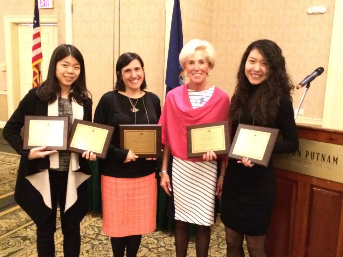 Michelle Rea, executive director of NYPA (2nd right), and staff members from Epoch Times hold five first-place awards won at the 2016 New York Press Association and Trade show in Saratoga Springs, N.Y., on April 9, 2016. (L-R) Designer Marie He, Digital Chief Editor Cindy Drukier, Michelle Rea of NYPA, Designer Kayla Zhu. (Epoch Times)