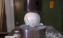 Watch a Hydraulic Press Crush a Jawbreaker