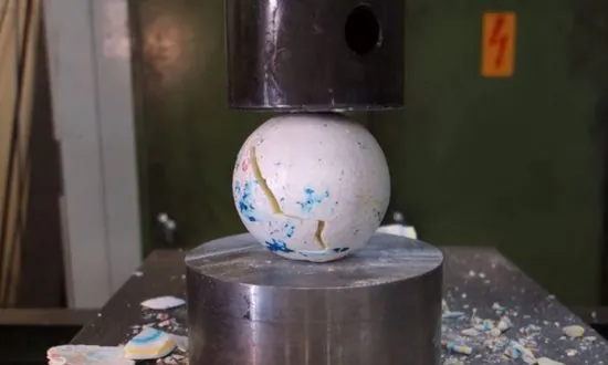 Watch a Hydraulic Press Crush a Jawbreaker