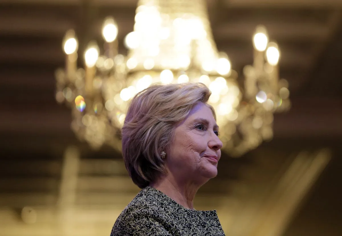 Democratic presidential candidate Hillary Clinton prepares to speak during a Suffolk County Democratic dinner in Holbrook, N.Y., Monday, April 11, 2016. (AP Photo/Seth Wenig)