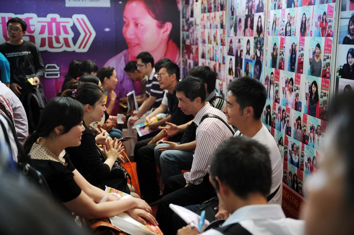 Visitors participate in speed dating at the second Shanghai Marriage Expo in Shanghai on May 27, 2012. (Peter Parks/AFP/Getty Images)