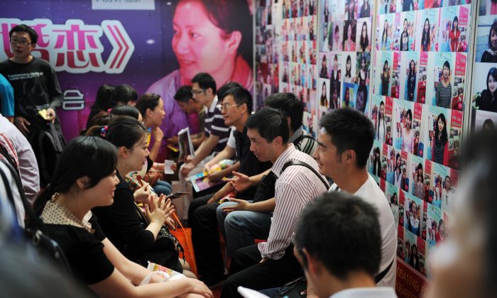 Visitors participate in speed dating at the second Shanghai Marriage Expo in Shanghai on May 27, 2012. (Peter Parks/AFP/Getty Images)