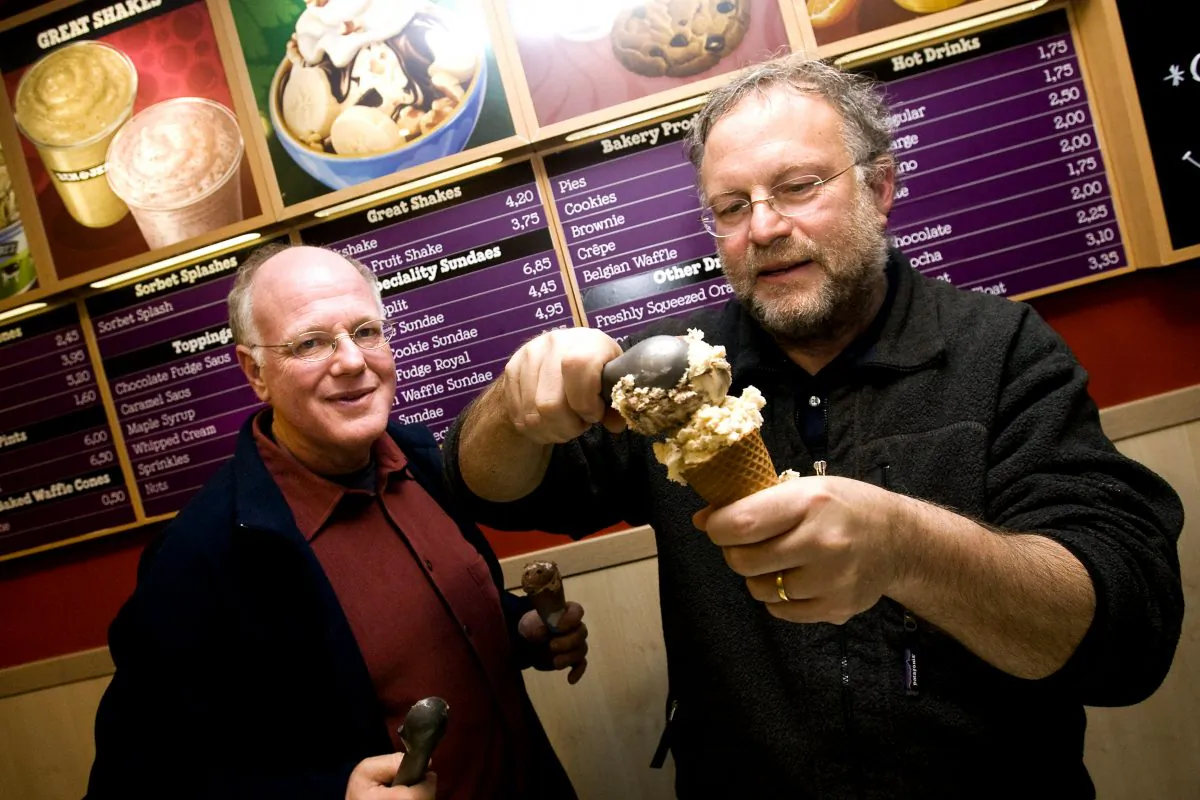 American ice cream makers Ben Cohen (L) en Jerry Greenfield, founders of the brand, Ben & Jerry's give out ice creams for free in their shop in the centre of Amsterdam, The Netherlands on Monday February 22, 2010. AFP PHOTO/ANP/ADE JOHNSON ***netherlands out - belgium out*** (Photo credit should read ADE JOHNSON/AFP/Getty Images)