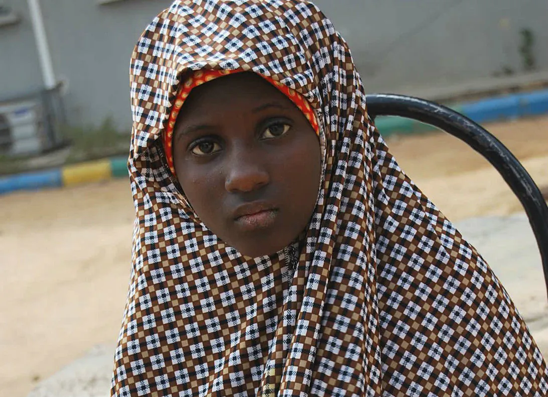 Wednesday Dec. 24, 2014 file photo, shows Zahra'u Babangida, a 13 year-old girl arrested with explosives strapped to her body in Kano Nigeria. The number of child bombers used by the Islamic extremists of Boko Haram has increased 10-fold in a year. (AP Photo/File)