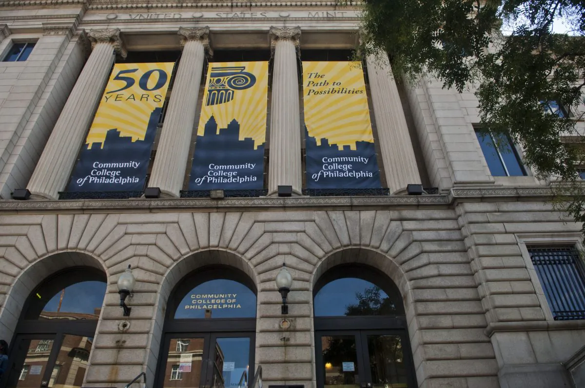 Community College of Philadelphia Mint Building decorated with banners celbrating the College's 50th Anniversary. Building was formerly the Third Philadelphia U.S. Mint. (CCPedu/Wikimedia, CC BY-SA)