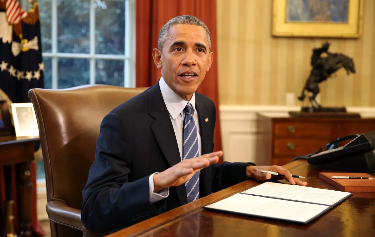 U.S. President Barack Obama prepares to sign a Presidential Memorandum known as "A Student Aid Bill of Rights to Help Ensure Affordable Loan Repayment" in the Oval Office of the White House on March 10, 2015 in Washington, DC. (Photo by Martin H. Simon - Pool/Getty Images)
