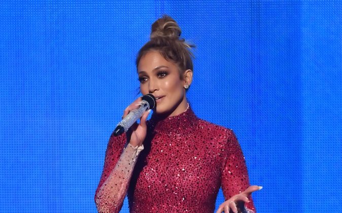 Host Jennifer Lopez performs speaks onstage during the 2015 American Music Awards at Microsoft Theater on November 22, 2015 in Los Angeles, California. (Photo by Kevin Winter/Getty Images)
