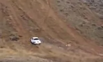 Man Launches His Truck Up Steep Hill
