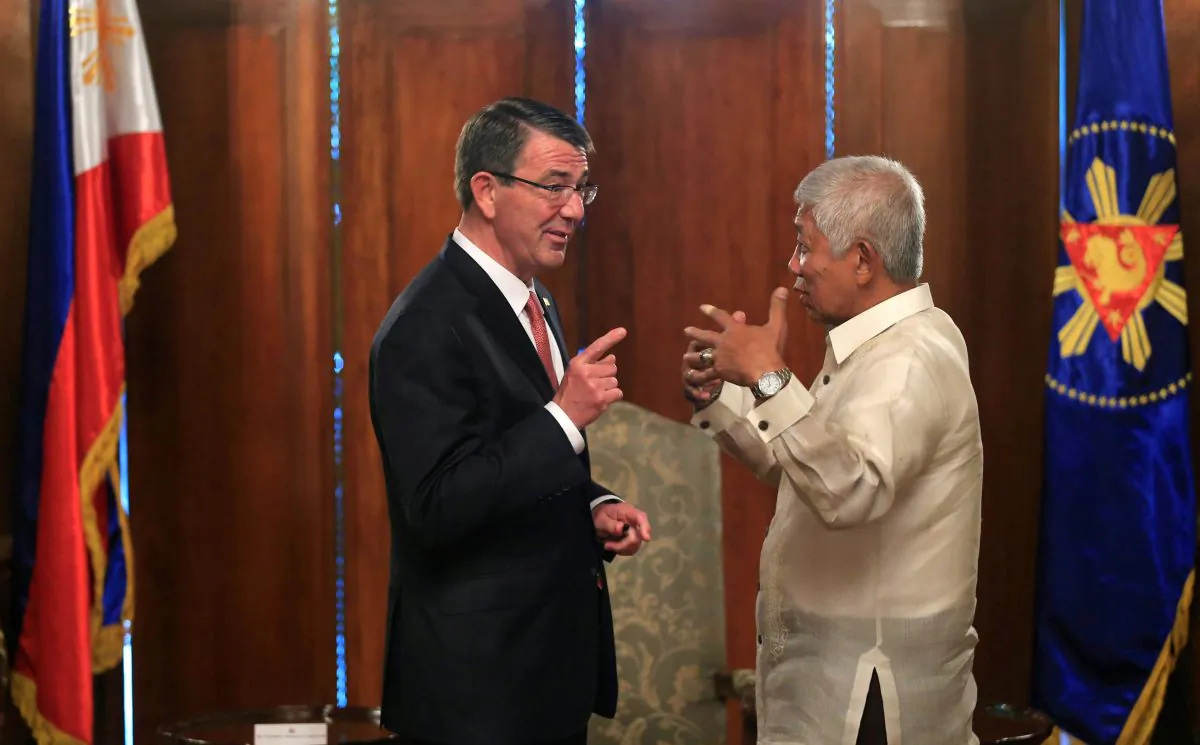 U.S. Defense Secretary Ash Carter, left, gestures as he talks with his Philippine counterpart Voltaire Gazmin during their joint press conference at the Malacanang presidential palace in Manila, Philippines on Thursday. (Romeo Ranoco/Pool Photo via AP)
