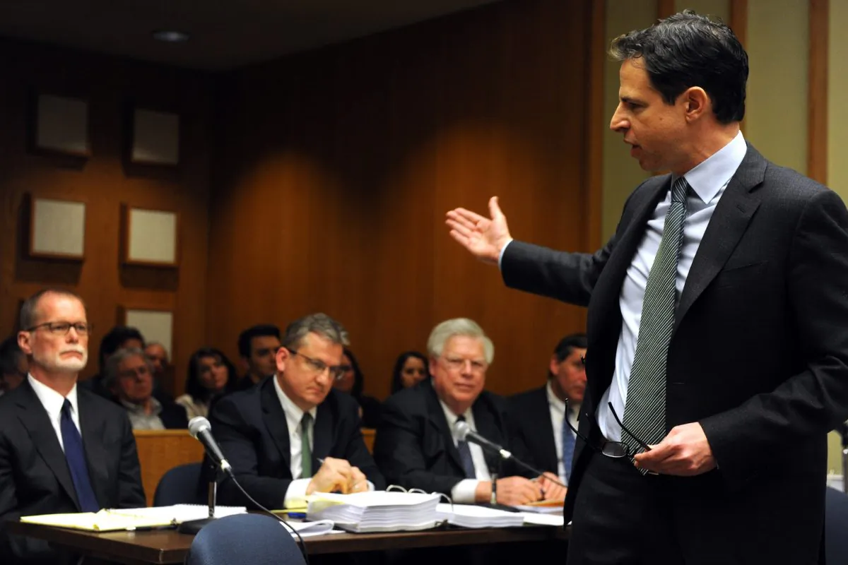 Attorney Joshua Koskoff, who represents a group of families of the Sandy Hook Elementary school shooting victims, speaks during final arguments in Superior Court, in Bridgeport, Conn., Monday, Feb. 22, 2016. (Ned Gerard/Hearst Connecticut Media via AP, Pool)