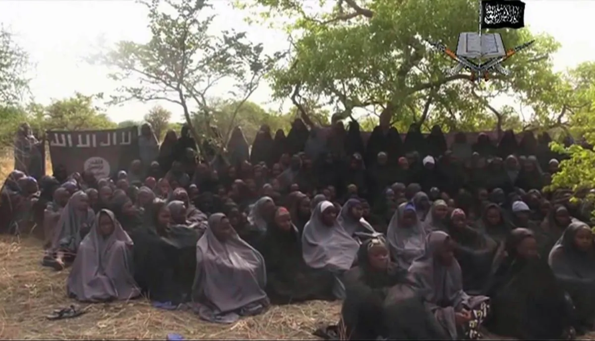 This Monday May 12, 2014 file image taken from video by Nigeria's Boko Haram terrorist network, shows the alleged missing girls abducted from the northeastern town of Chibok. (AP Photo/File)
