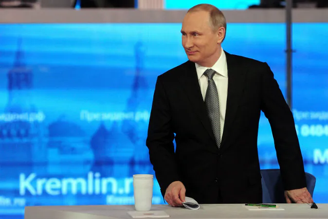 Russian President Vladimir Putin arrives at his annual call-in show in Moscow, Russia, on April 14, 2016. (Mikhail Klimentyev/Sputnik, Kremlin Pool Photo via AP)