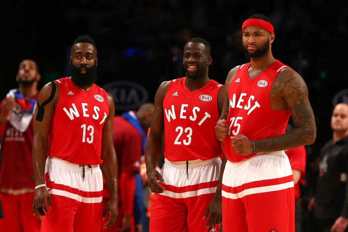 James Harden #13 of the Houston Rockets, Draymond Green #23 of the Golden State Warriors, and DeMarcus Cousins #15 of the Sacramento Kings during NBA All-Star Game 2016 in Toronto on Feb. 14, 2016. The KIA advertising is visible on their jerseys. (Elsa/Getty Images)