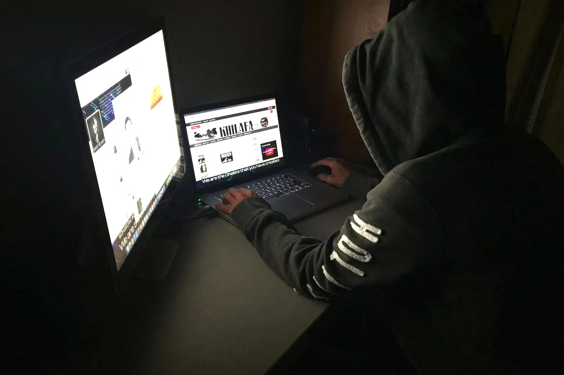 Anti-terrorist hacker with Anonymous, WauchulaGhost, works at a computer from an undisclosed location. (WauchulaGhost)