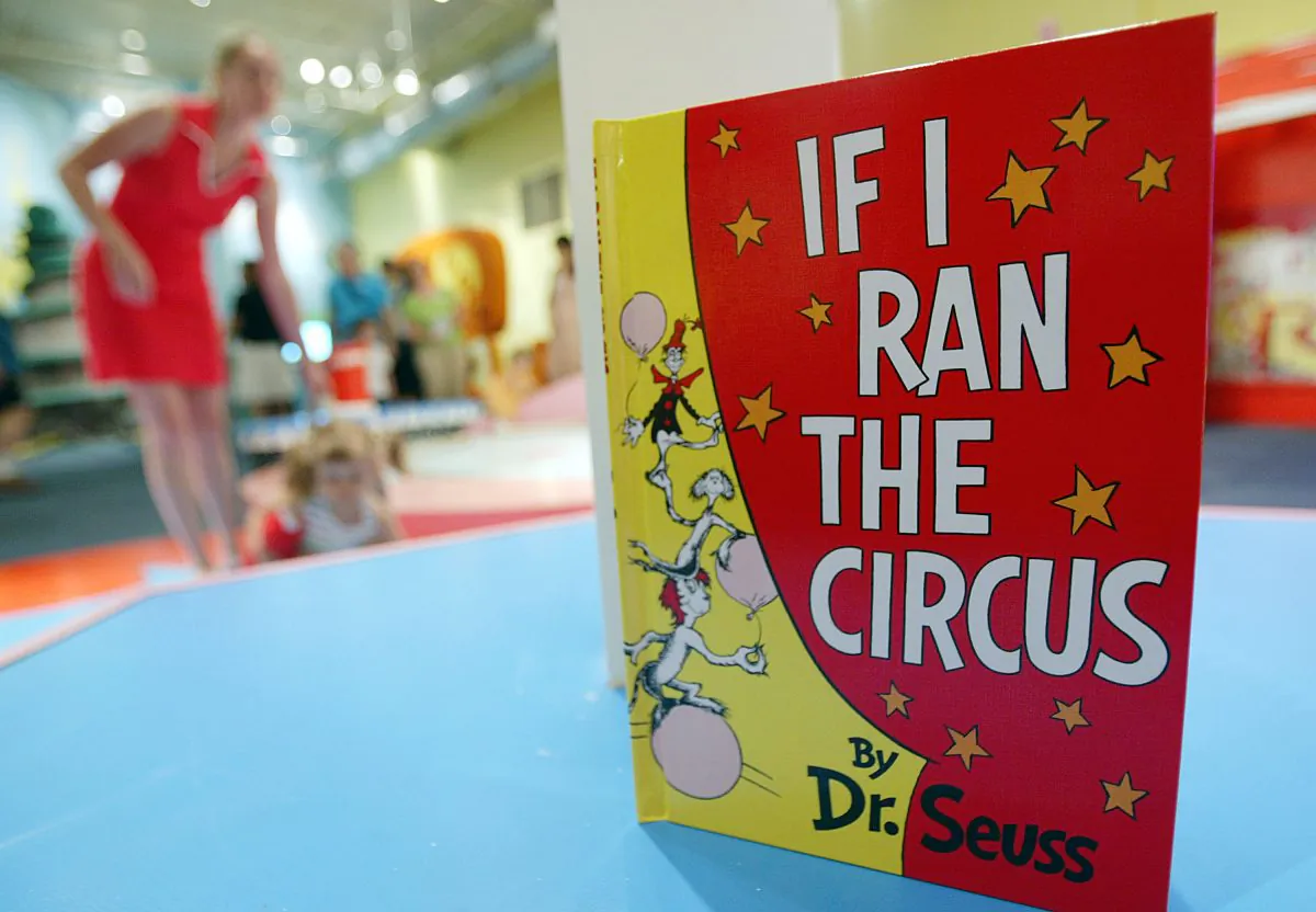 A Dr. Seuss book is seen as children play during a press preview of an interactive exhibition dedicated to Dr. Seuss at the Children's Museum of Manhattan July 6, 2004 in New York City. (Mario Tama/Getty Images)