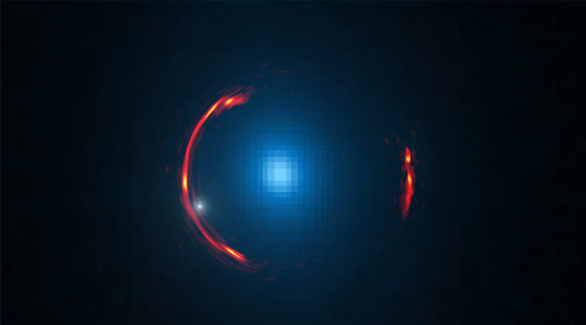 Composite image of the gravitational lens SDP.81 showing the distorted image of the more distant galaxy (red arcs) and the nearby lensing galaxy (blue center object). (Y. Hezaveh/Stanford; ALMA/NRAO/ESO/NAOJ; NASA/ESA Hubble Space Telescope)