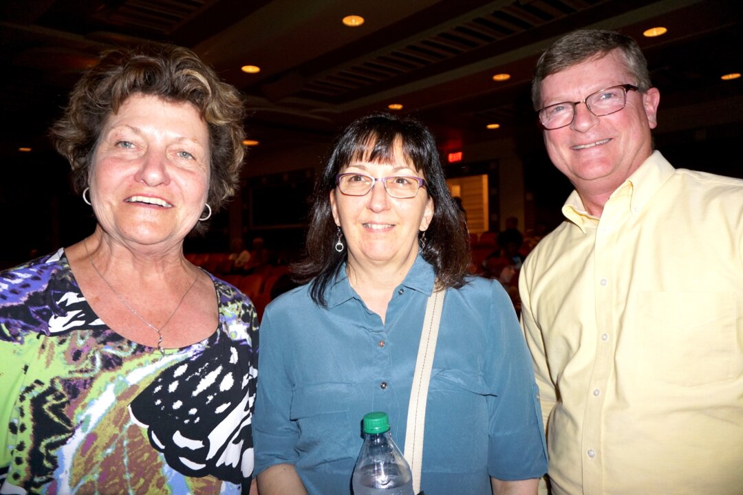 (L–R) Kate Spangler, Kathy and Dan Bowerman, drank in the beauty of Shen Yun at Davenport's Adler Theatre on April 17. (Catherine Wen/Epoch Times)