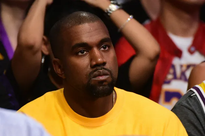 Kanye West looks on as he watches as the Los Angeles Lakers take on the Utah Jazz at Staples Center on April 13, 2016 in Los Angeles, California. (Photo by Harry How/Getty Images)