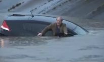 Reporter Rescues Man From Flooded Car on Live TV