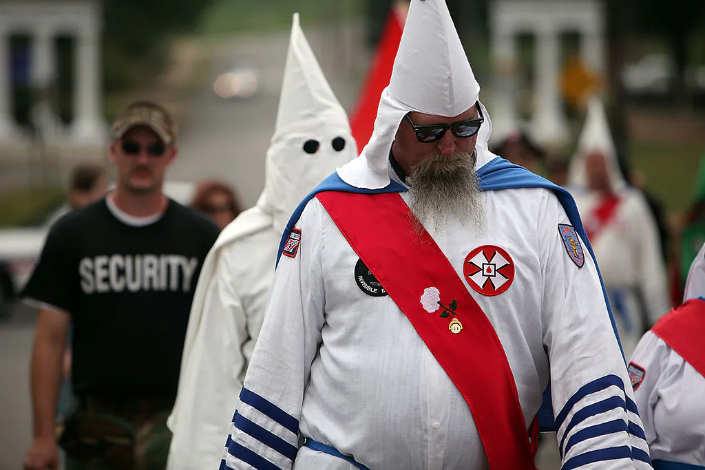 Members of the Fraternal White Knights of the Ku Klux Klan participate in the 11th Annual Nathan Bedford Forrest Birthday march July 11, 2009, in Pulaski, Tennessee. Hackers have launched an online campaign to shut down websites of the KKK and other hate groups. (Spencer Platt/Getty Images)