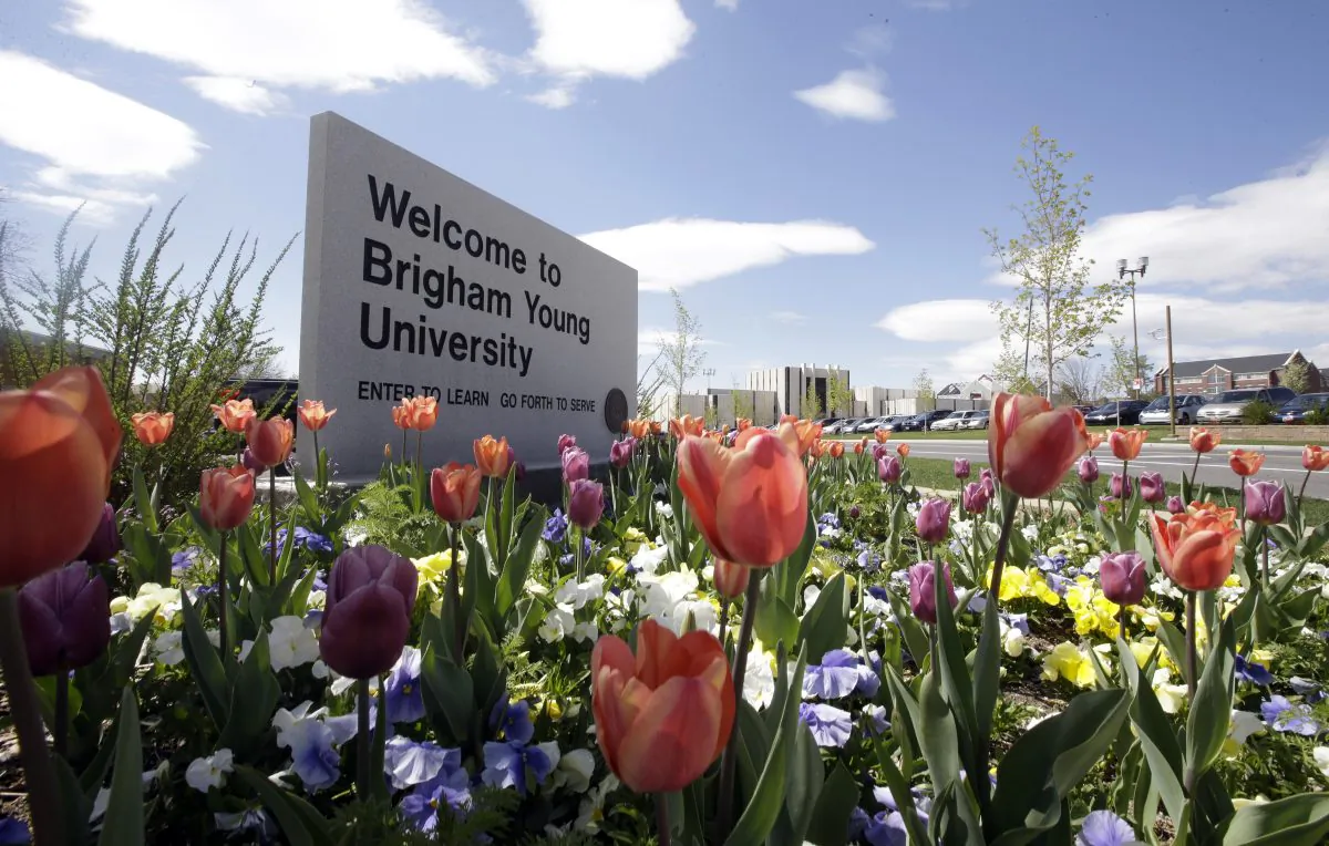 In this Tuesday, April 19, 2016, a welcome sign to Brigham Young University sits at the school in Provo, Utah. BYU students who say they were sexually assaulted are finding themselves under investigation for possible violations of the Mormon school's code against sex and drinking. BYU says it will re-evaluate the practice. (AP Photo/Rick Bowmer)