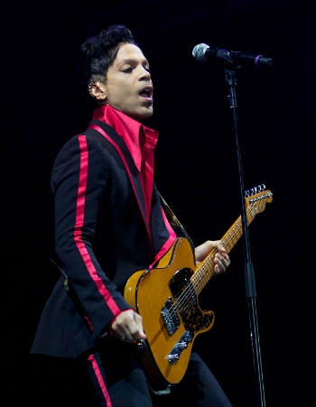  In this Nov. 14, 2010 file photo, musician Prince performs in Yas Island, on the final night of the F1 motor race meeting in Abu Dhabi, United Arab Emirates. (AP Photo/Nousha Salimi, File)
