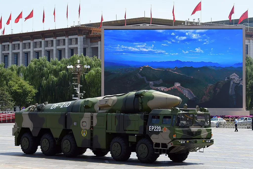 A Chinese military vehicle carries a DF-21D missile after a military parade at Tiananmen Square in Beijing on Sept. 3, 2015. The Chinese regime recently tested a new intercontinental ballistic missile that can allegedly strike the United States. (Greg Baker/AFP/Getty Images)