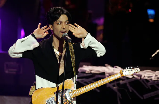 Musician Prince performs on stage at the 36th NAACP Image Awards at the Dorothy Chandler Pavilion on March 19, 2005 in Los Angeles, California. Prince was honored with the Vanguard Award. (Photo by Kevin Winter/Getty Images)
